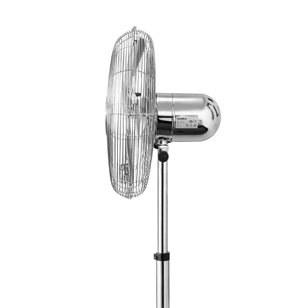 The side of a chrome standing fan with the back and motor on the left hand side and the fan itself facing right