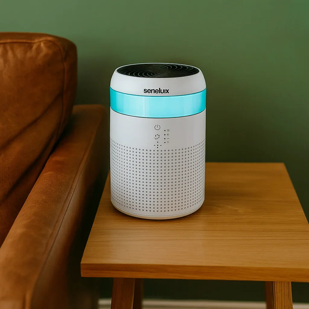 An air purifier sitting on a table next to a sofa