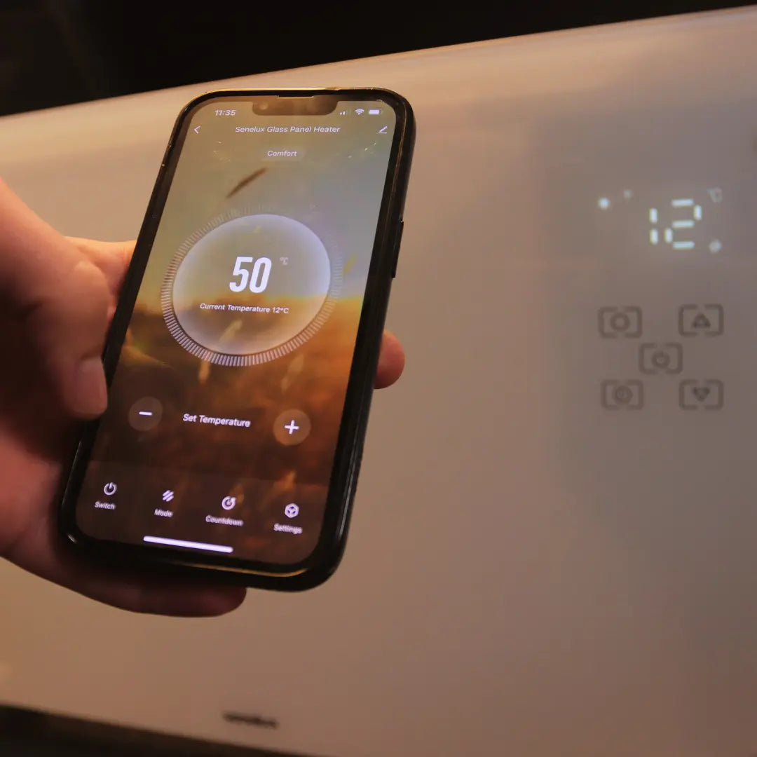 An image of a phone with the smart app connected to a Senelux glass panel heater