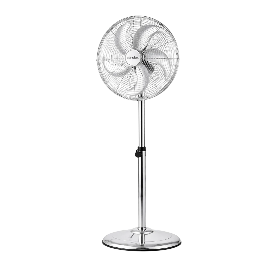 A chrome standing fan angled away from the camera with Senelux branding