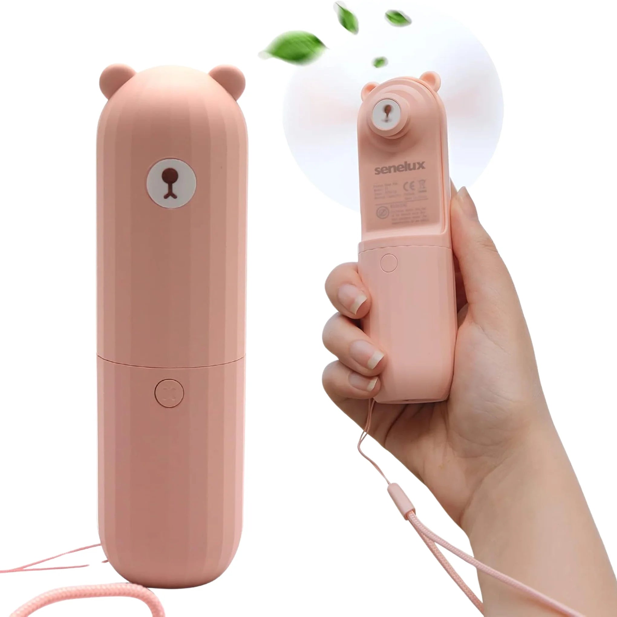 The pink pocket fan being shown on the left side in the locked position whilst another is shown in a hand on the right