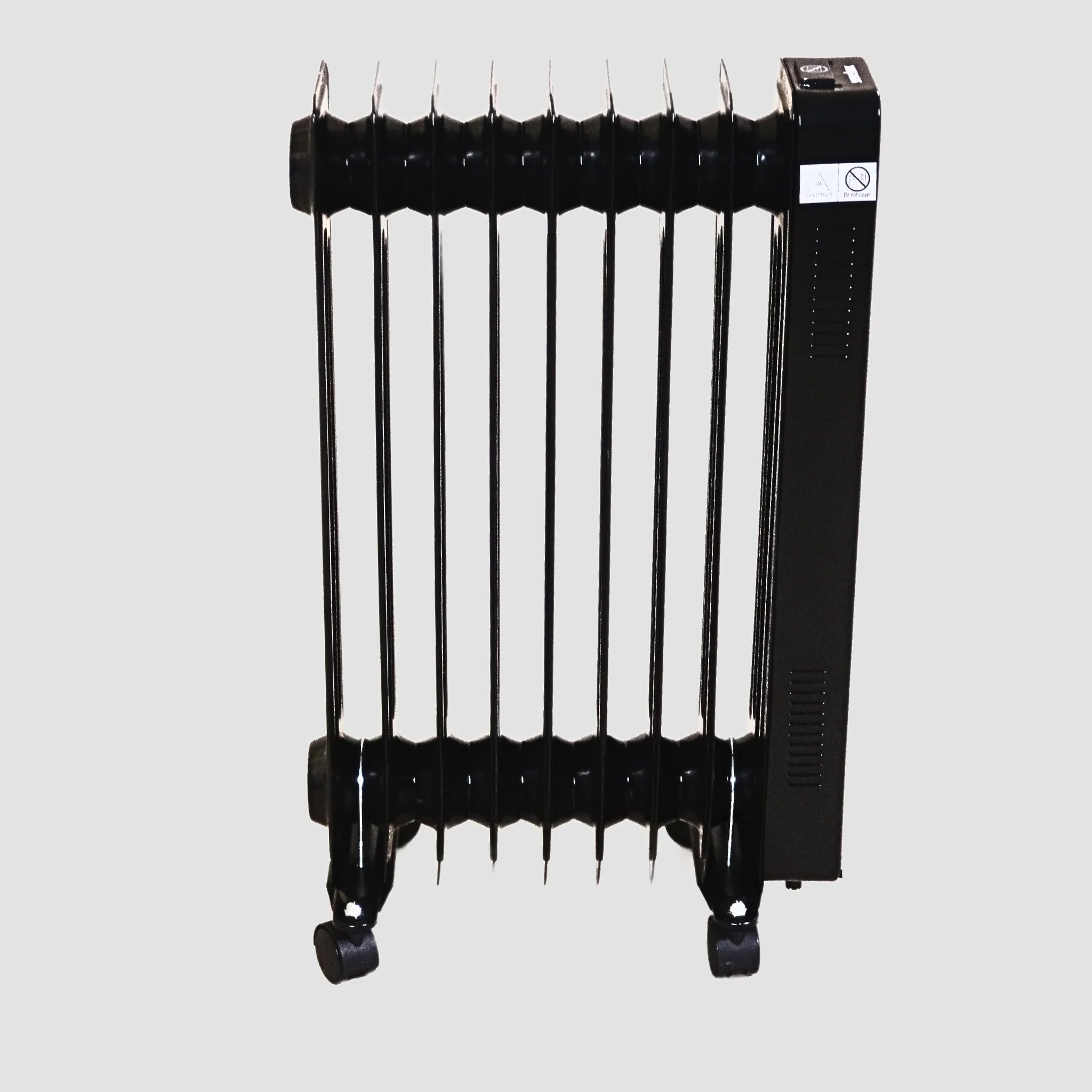 A side on picture of the Senelux Oil Filled Heater showing the 9 powerful heating ribs